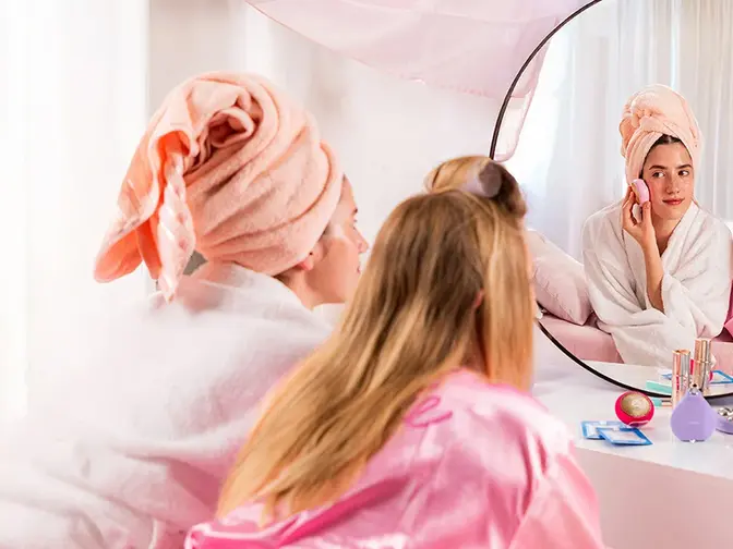 Girlfriends enjoying a spa day at home celebrating Global Wellness Day 